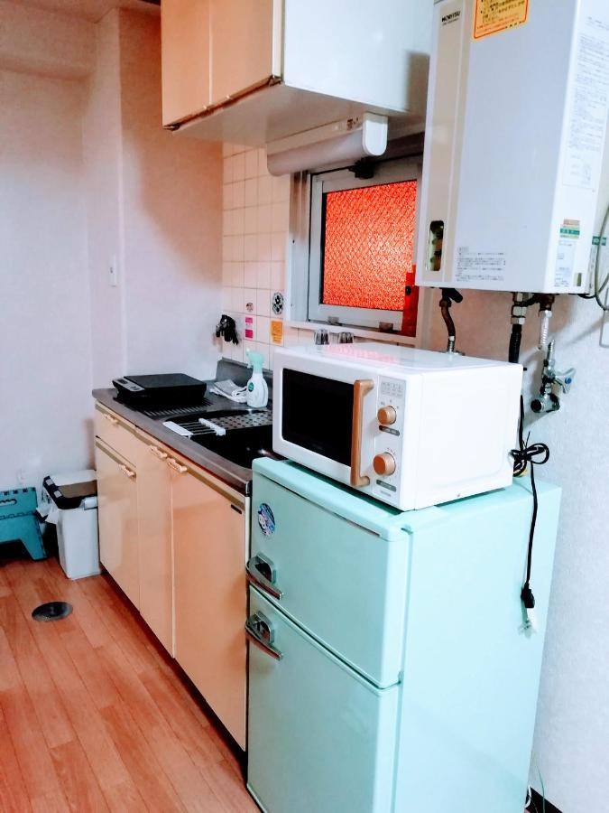 Апартаменты Luxes Hiroshima2F ラクセス ヒロシマ2F Экстерьер фото